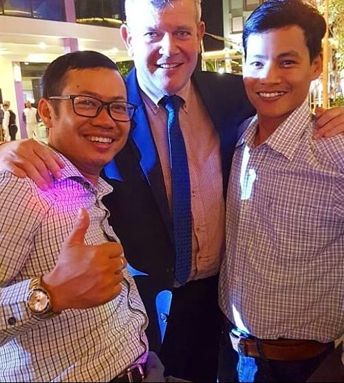 Stephane Meunier celebrating with construction engineers on the Cocobay Da Nang project