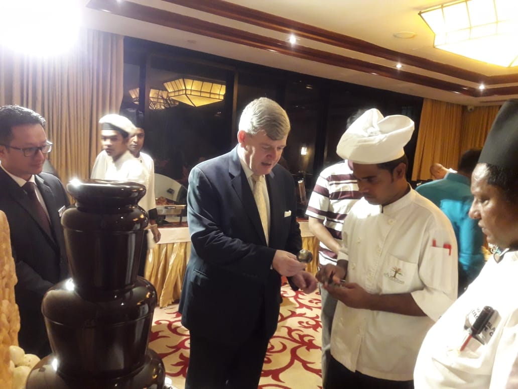 Stephane Meunier with a hotel culinary team at a banquet event
